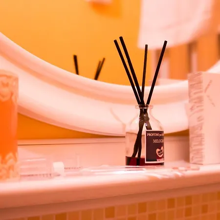 Couette-café Via Roma 4*